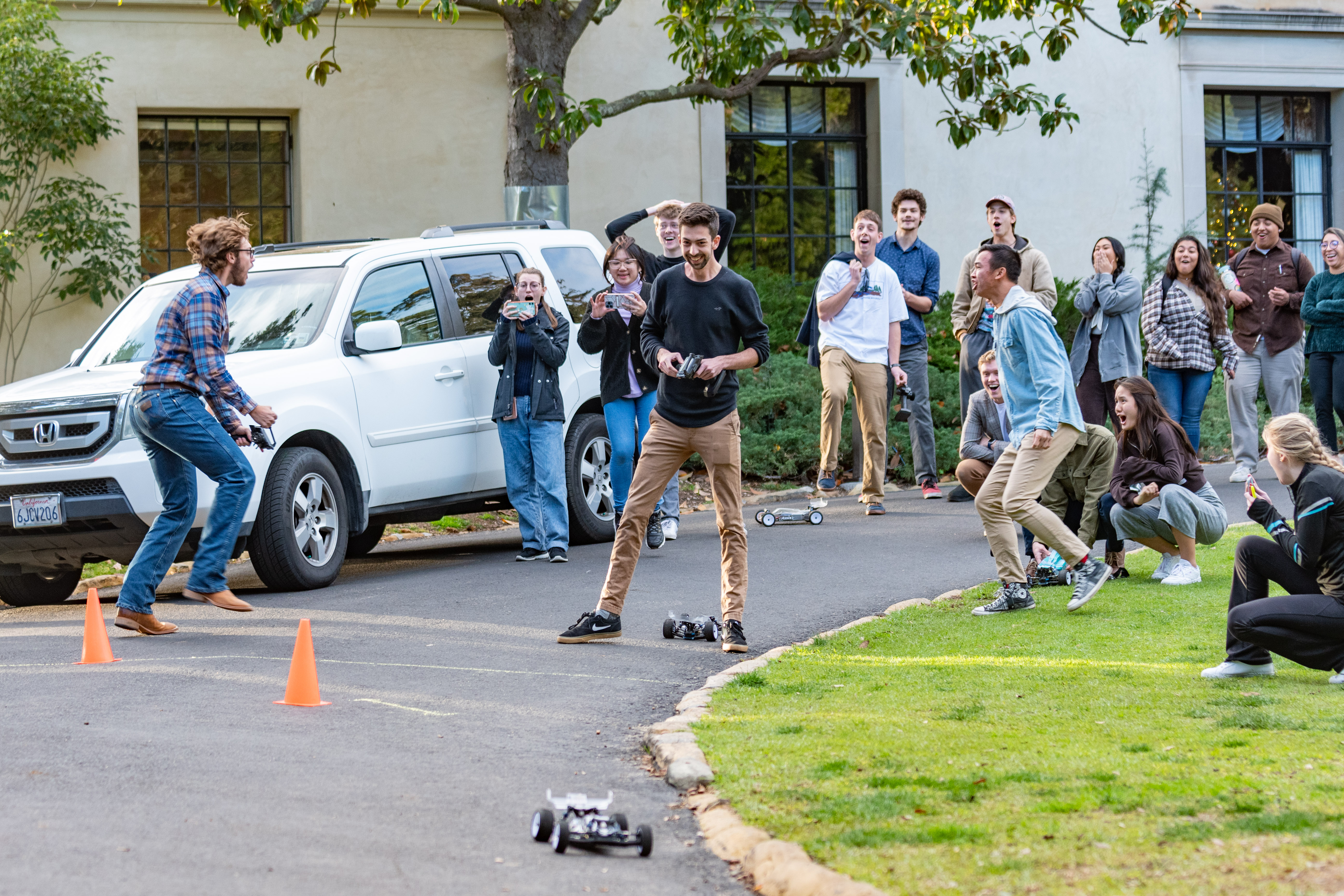 Engineering students cheering at RC car race