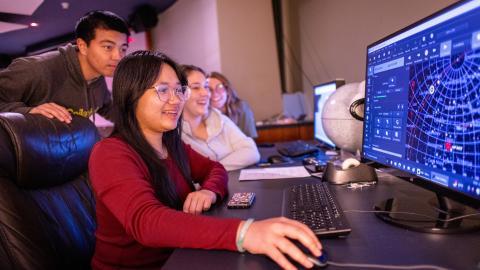 Astrophysics Minor students on computer