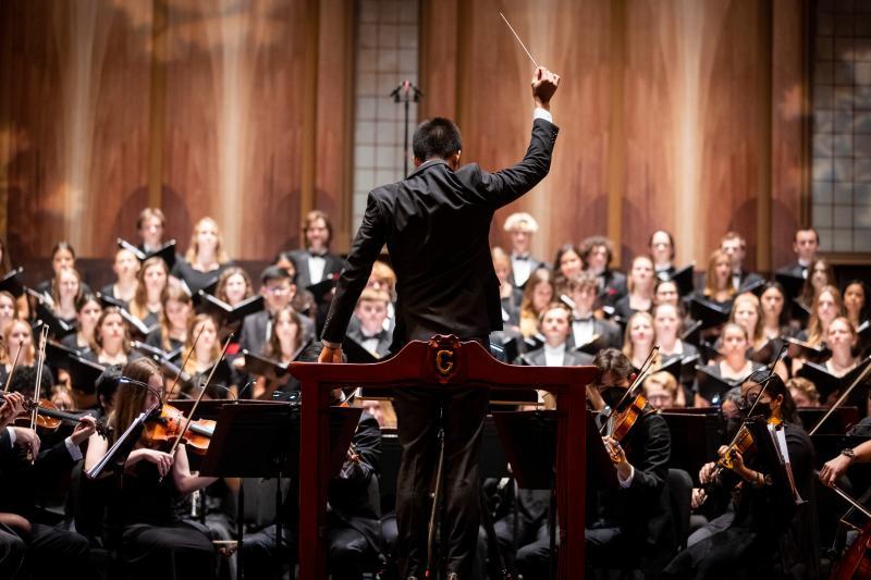 Dr. Daniel Gee Conducting Choirs and Orchestra